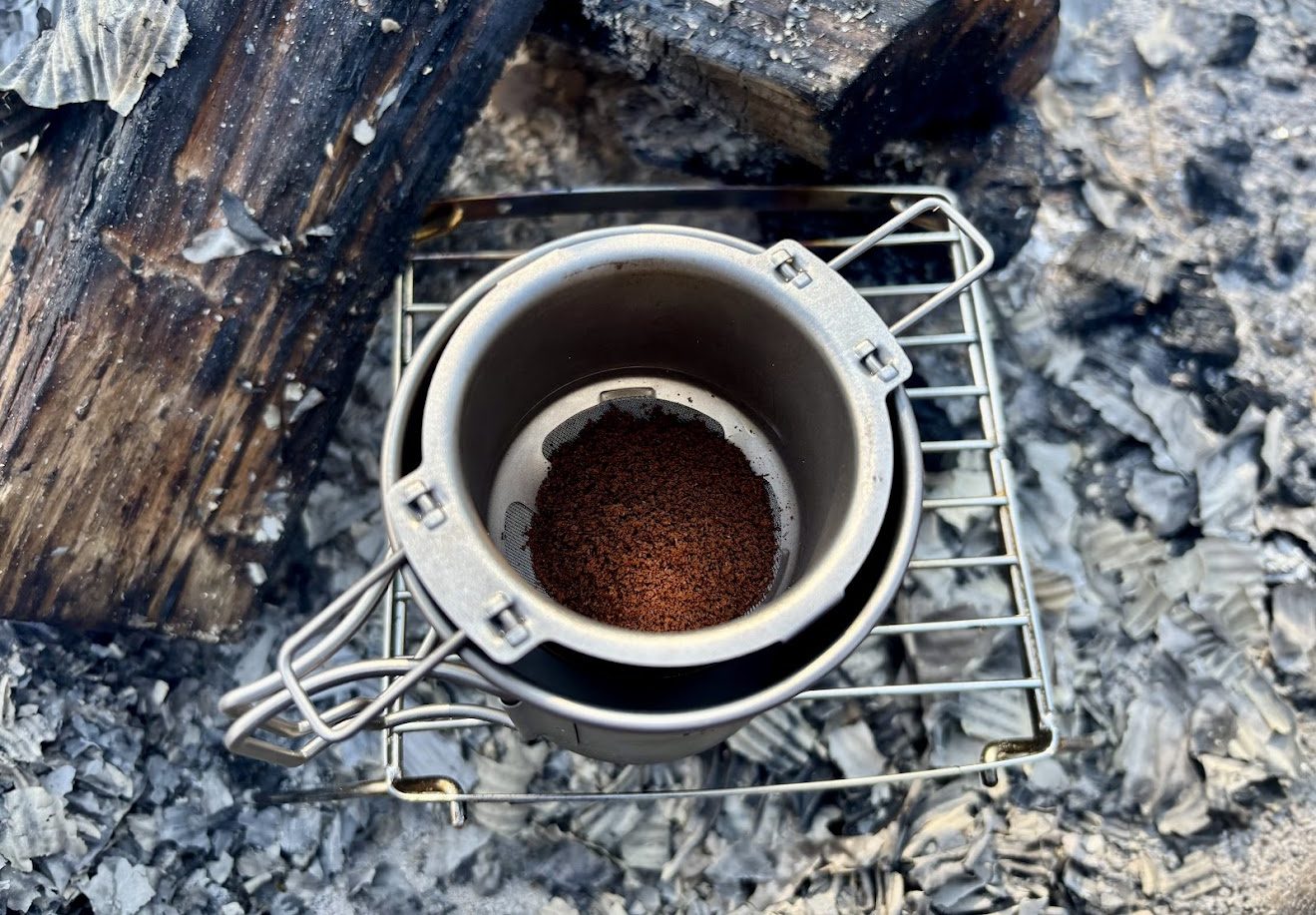 Coffeeground in titanium coffee filter used with a Boundless Voayge titanium cup