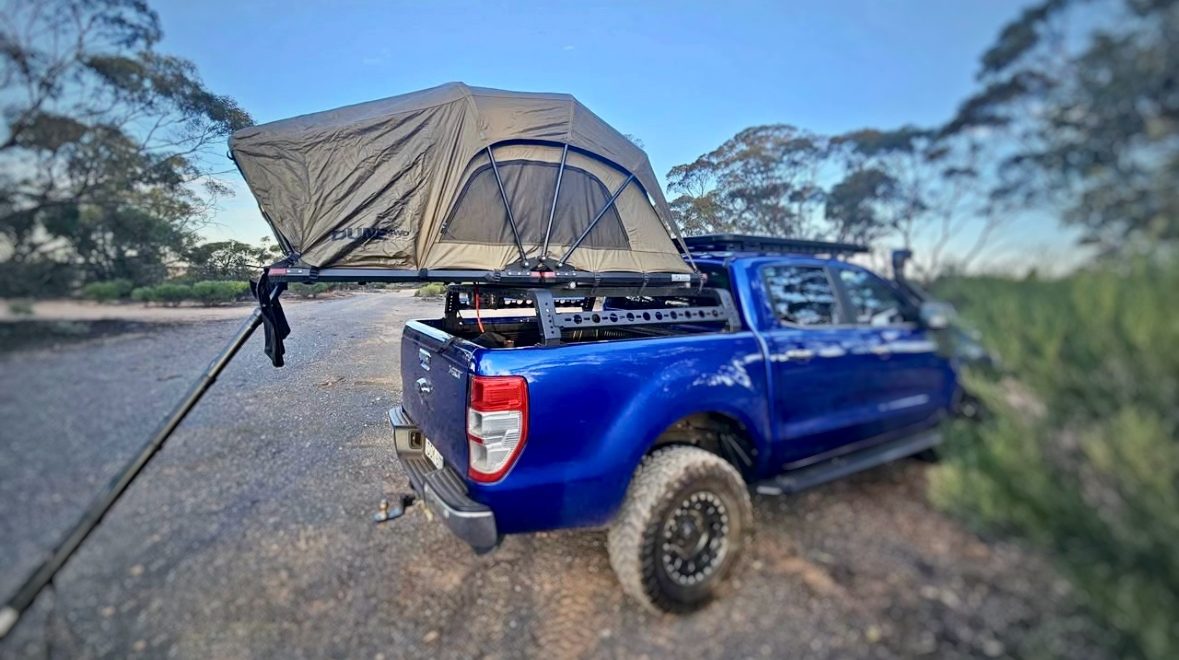 Dune Rooftop Tent folded open on the back of Ford Ute