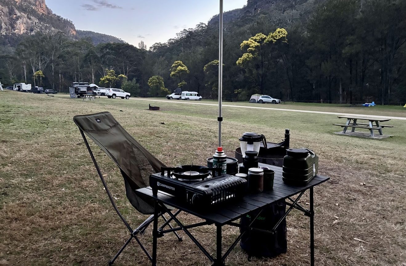 Green compact Naturehike chair has the perfect seating height for the Kings folding table