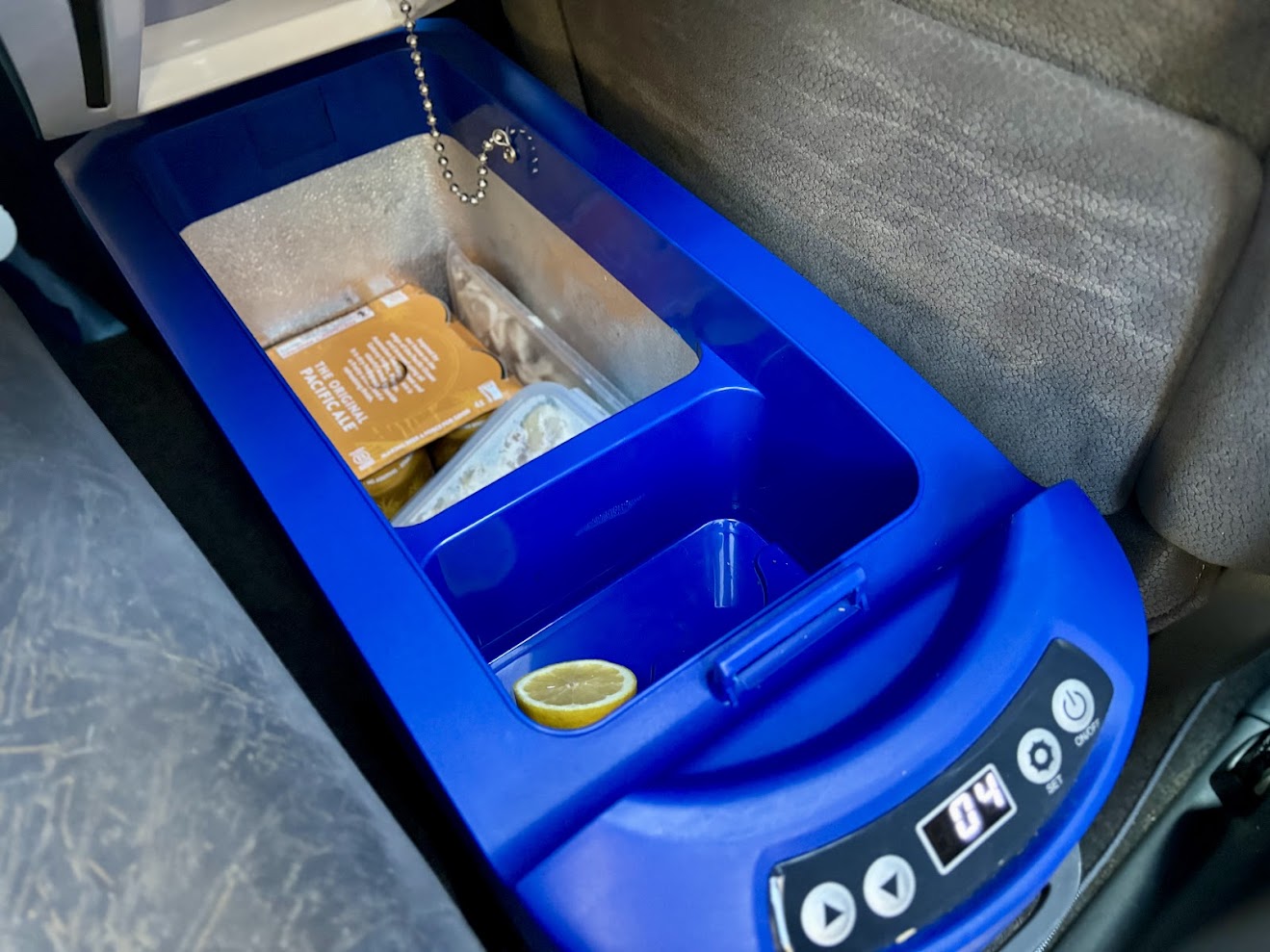 The 15L Kings center console fridge​ packed with beer and fresh fruit