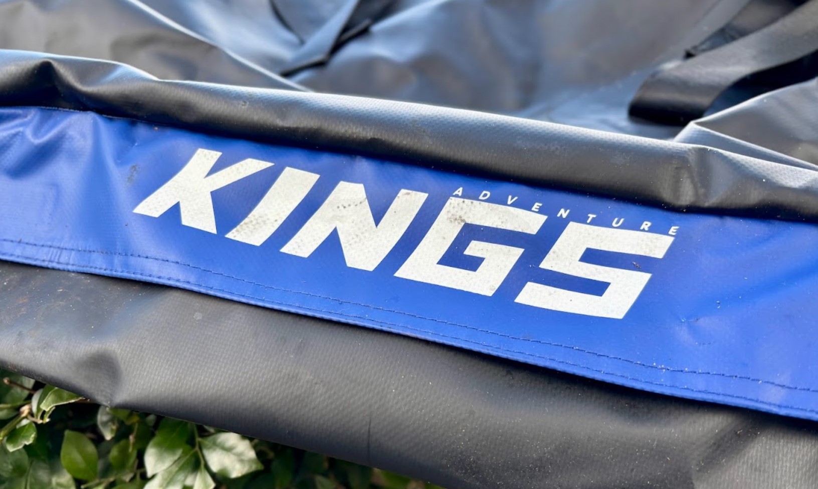 Close-up of logo on the side of the Kings rooftop bag