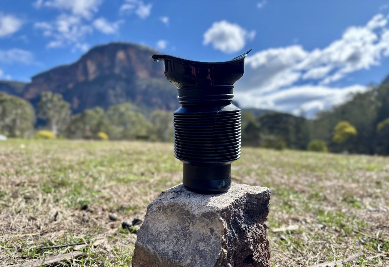 Collapsed black portable urinal​ at Coorongooba Campground