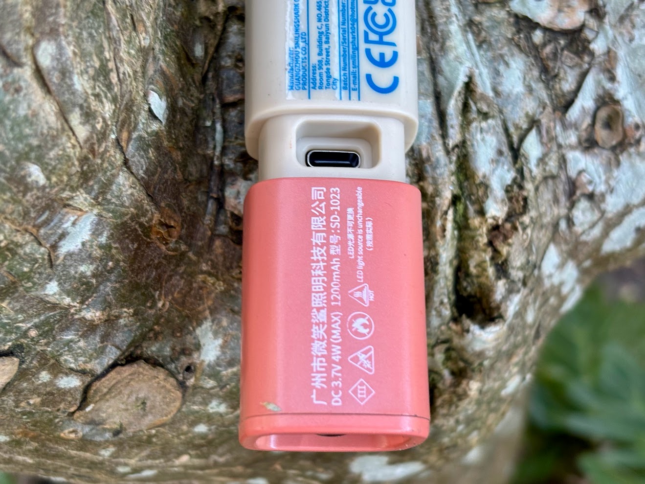 Middle slide on the camping torch to access USB-C charging input