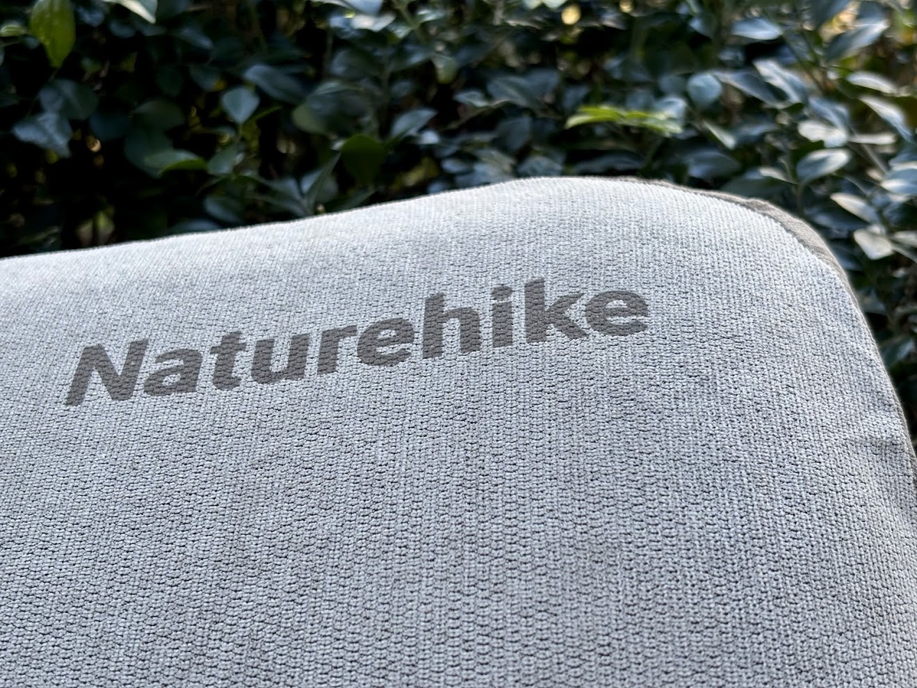 Naturehike logo on front of travel memory foam pillow​