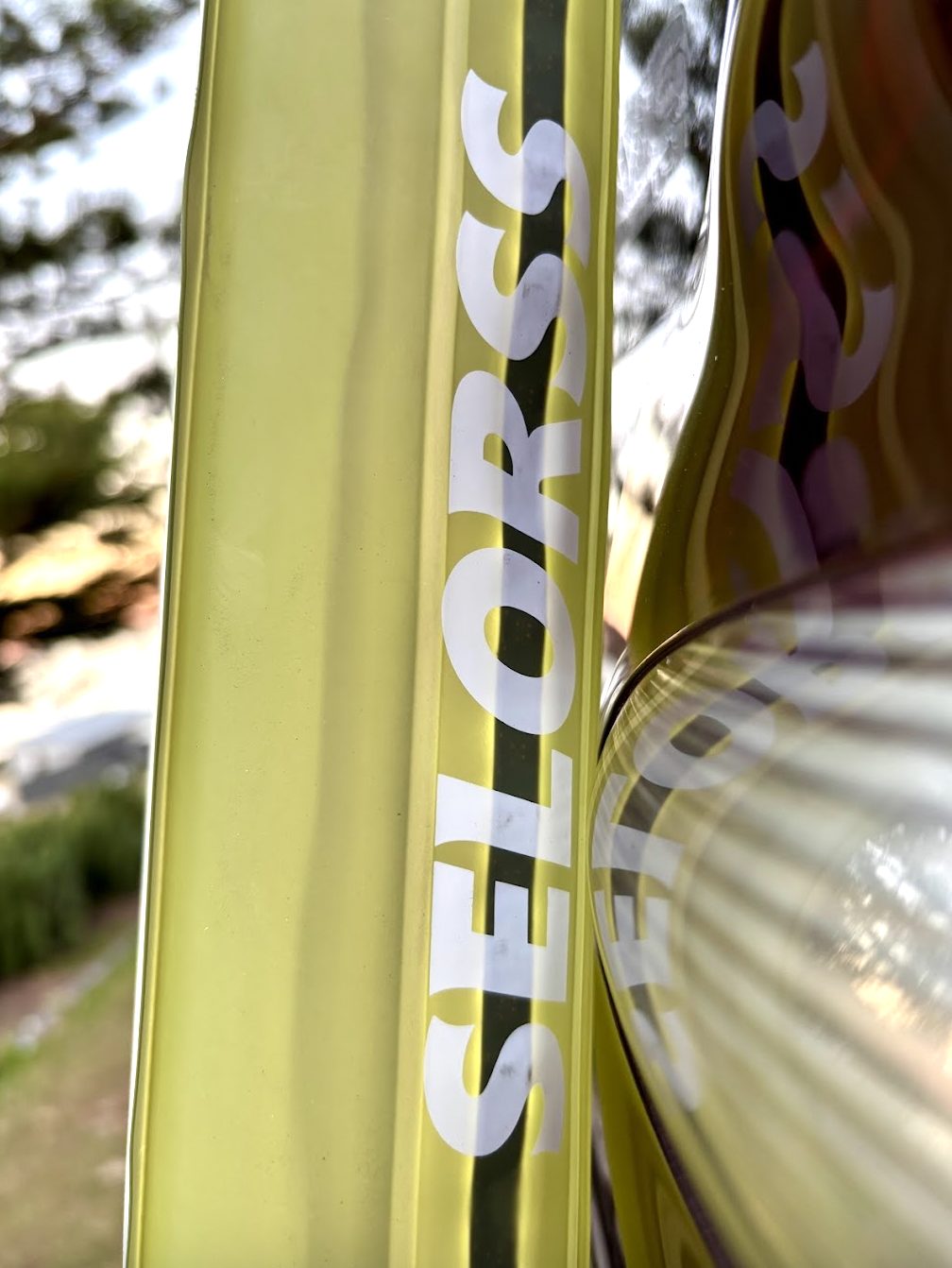 Selorss Waterproof Camp Light Tube Inflated with logo hanging of the side of the car