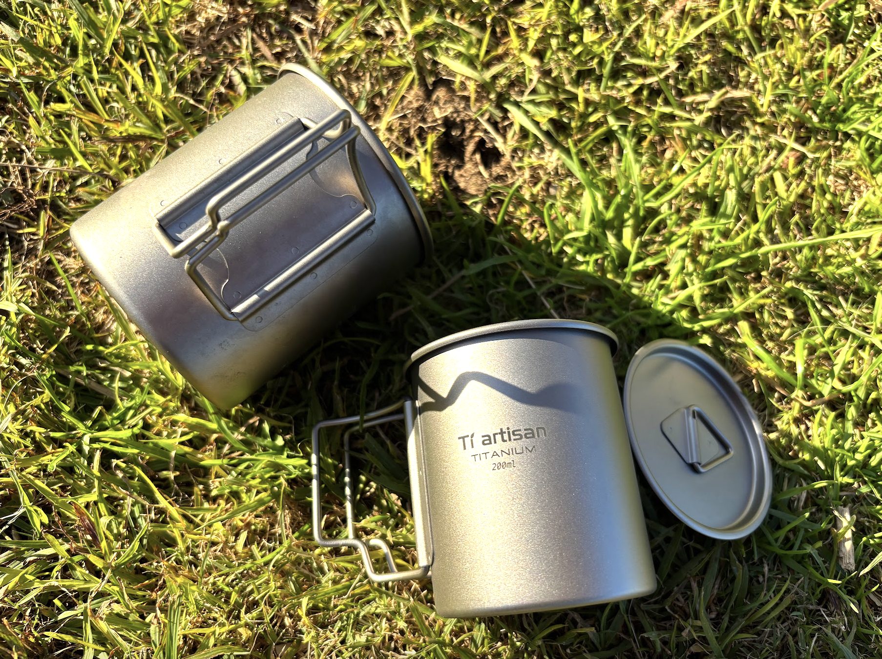 Side view with foldable handle on these titanium cups from Ti Artisan