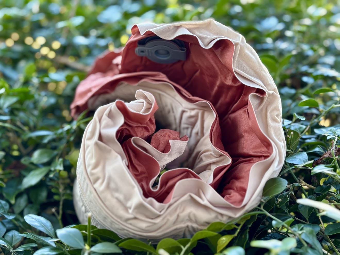Uninflated Naturehike inflatable travel pillow​ rolled up