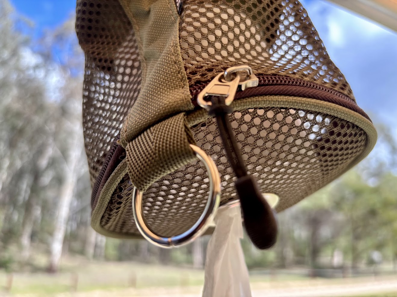 Using the green mesh camping toilet paper holder at Coorongooba Campground