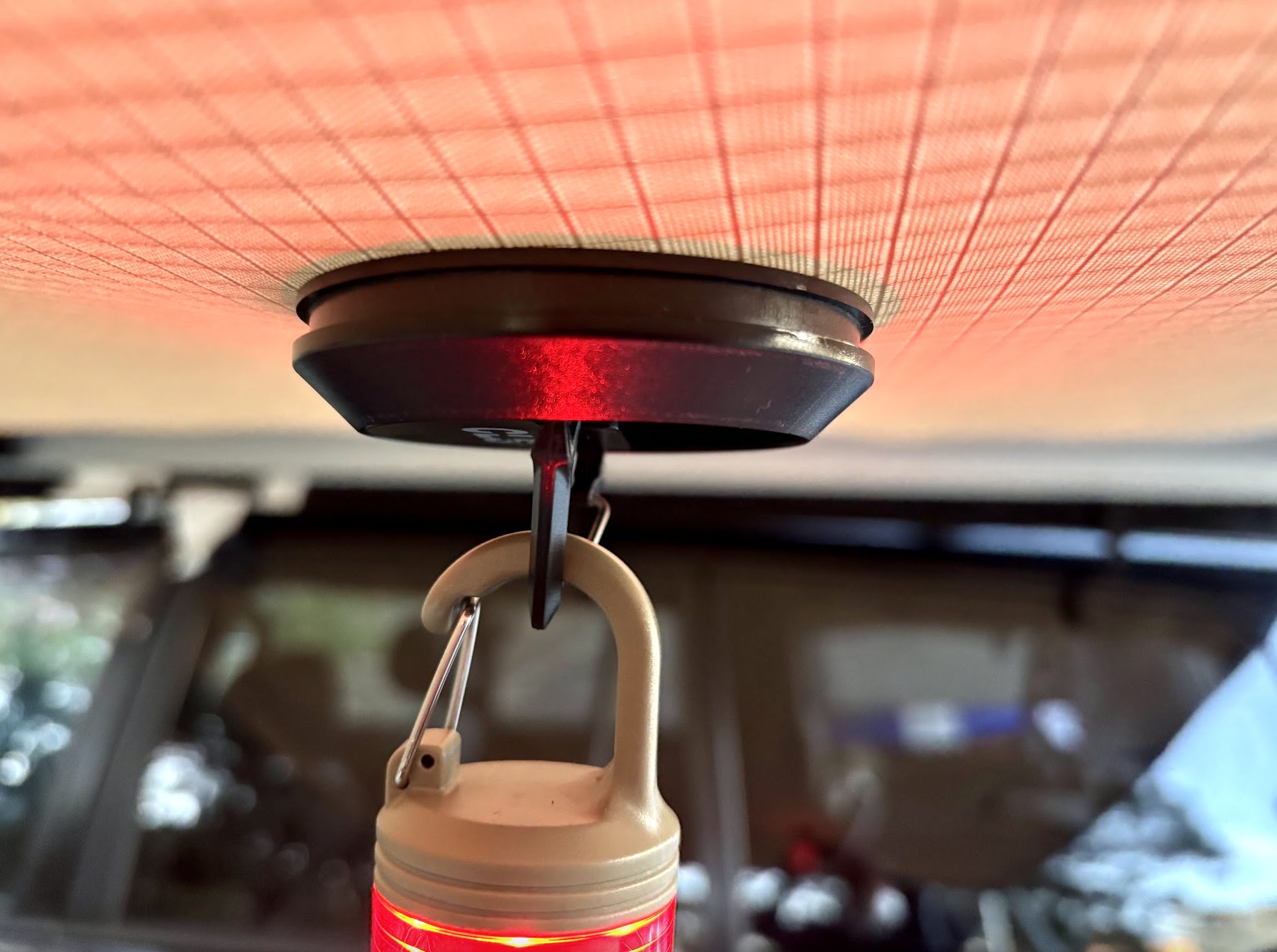 Using heavy duty magnetic hooks for hanging camp lights to the 170GSM ripstop polyester material of the Kings 2.5x2.5 awning