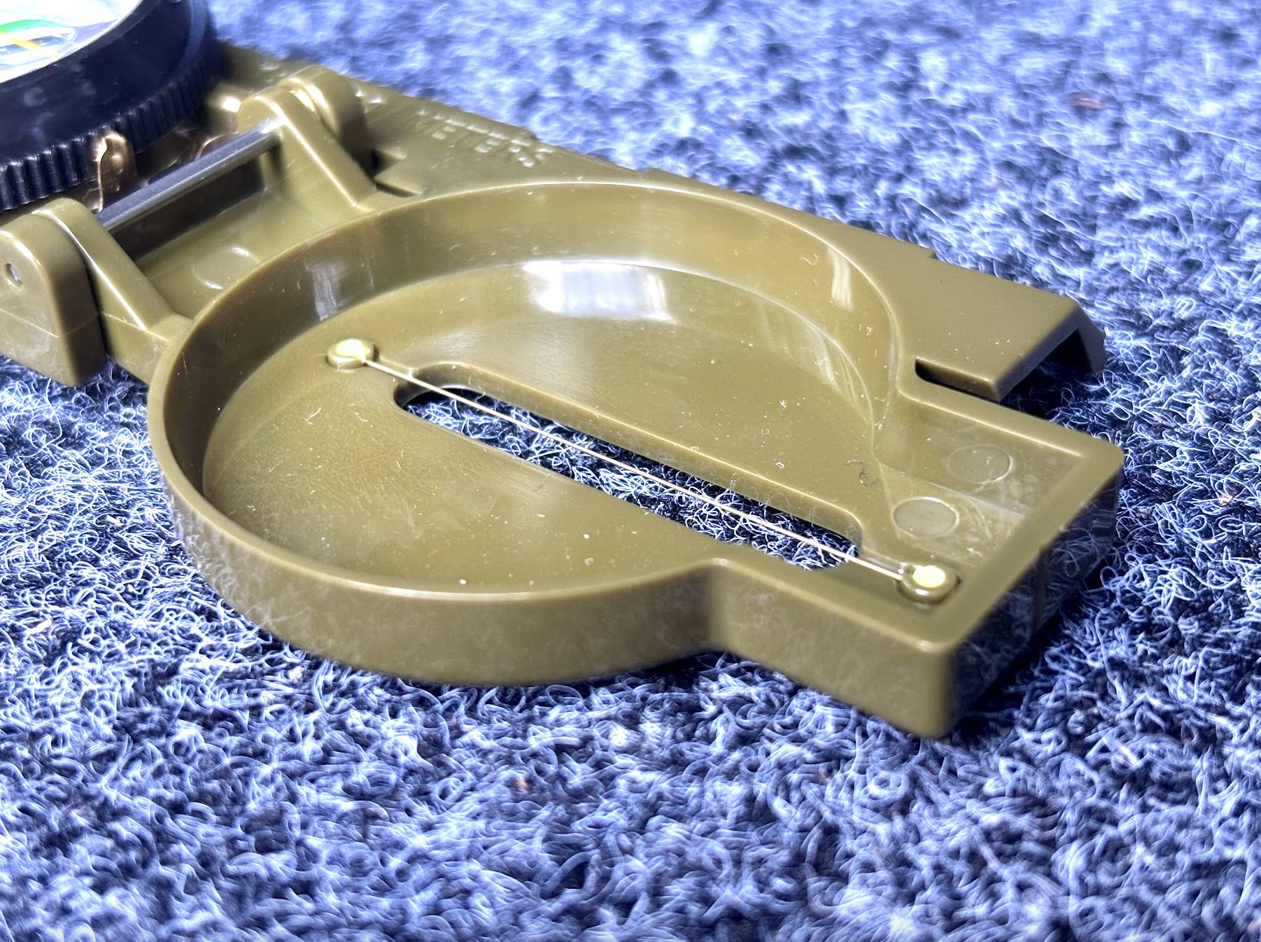 off-road compass unfolded lid close-up