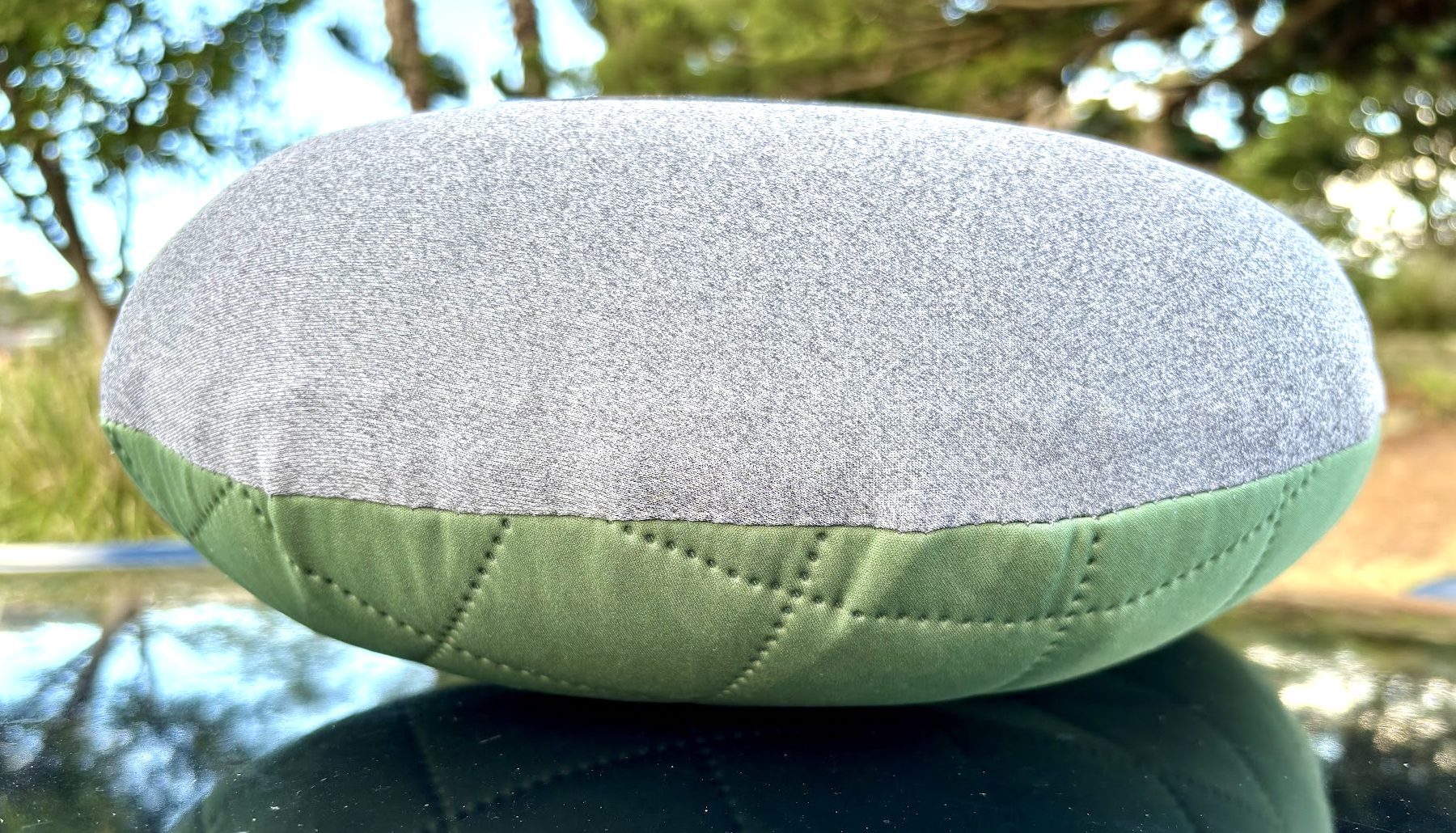 Side view of inflated Hikenture ultralight travel pillow