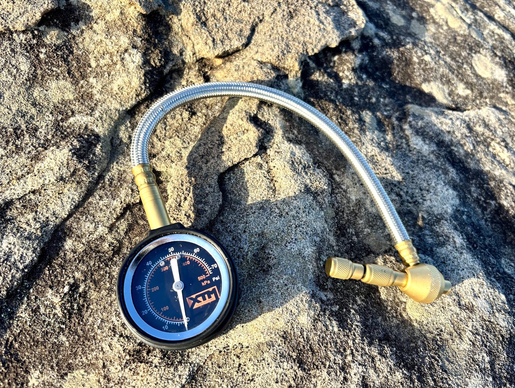 Taking the XTM tyre deflator out of the pouch, the deflator feels solid and well-made, especially for its price