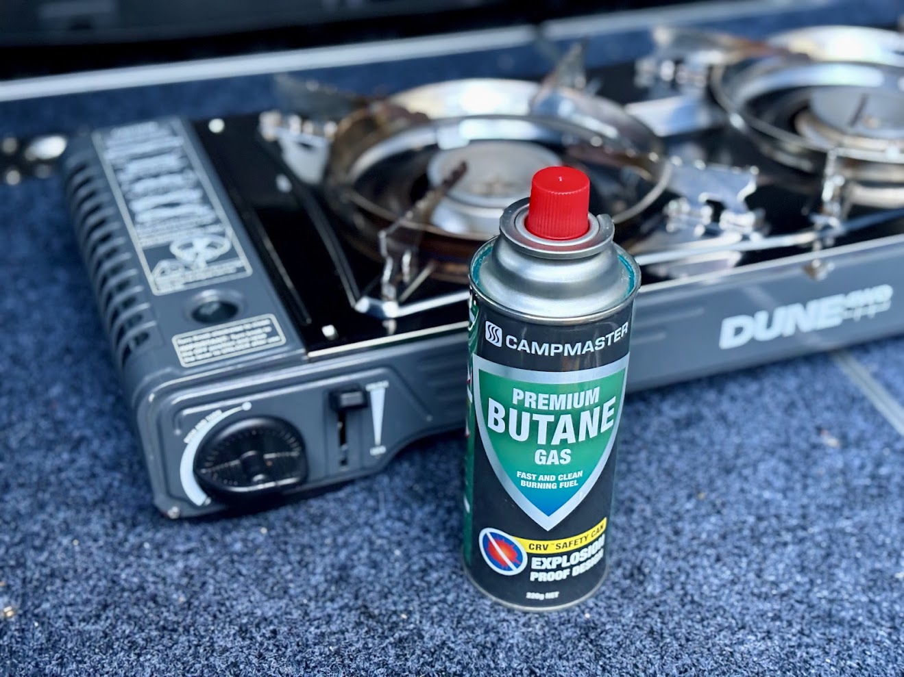Burning gas bottle compatible with Dune Camp Stove
