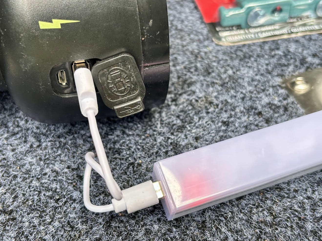 Charging a rear back door light by using the Coleman LED lantern as power bank