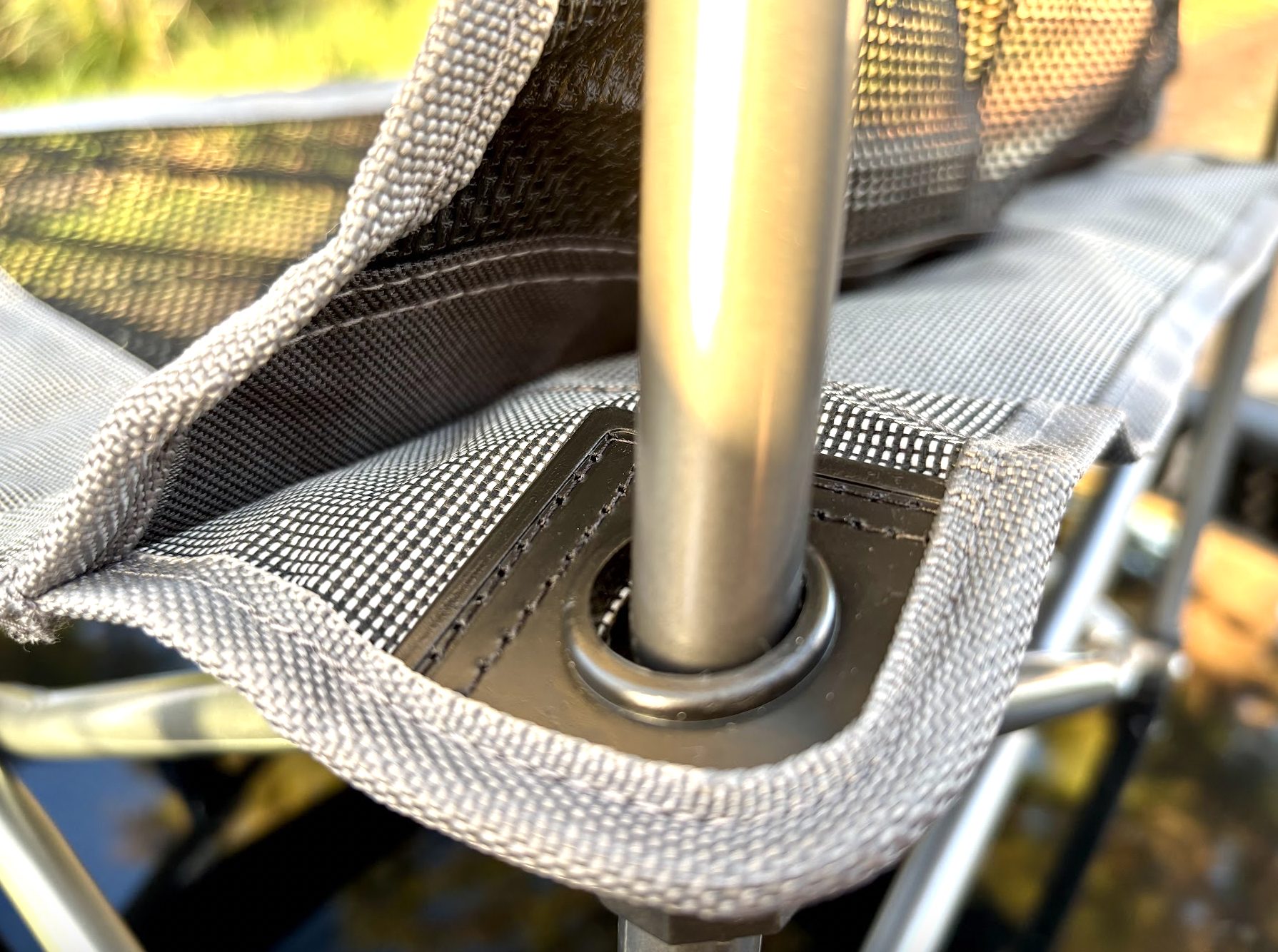 600D mesh seat of the Coleman Quad Deluxe Mesh Event Chair