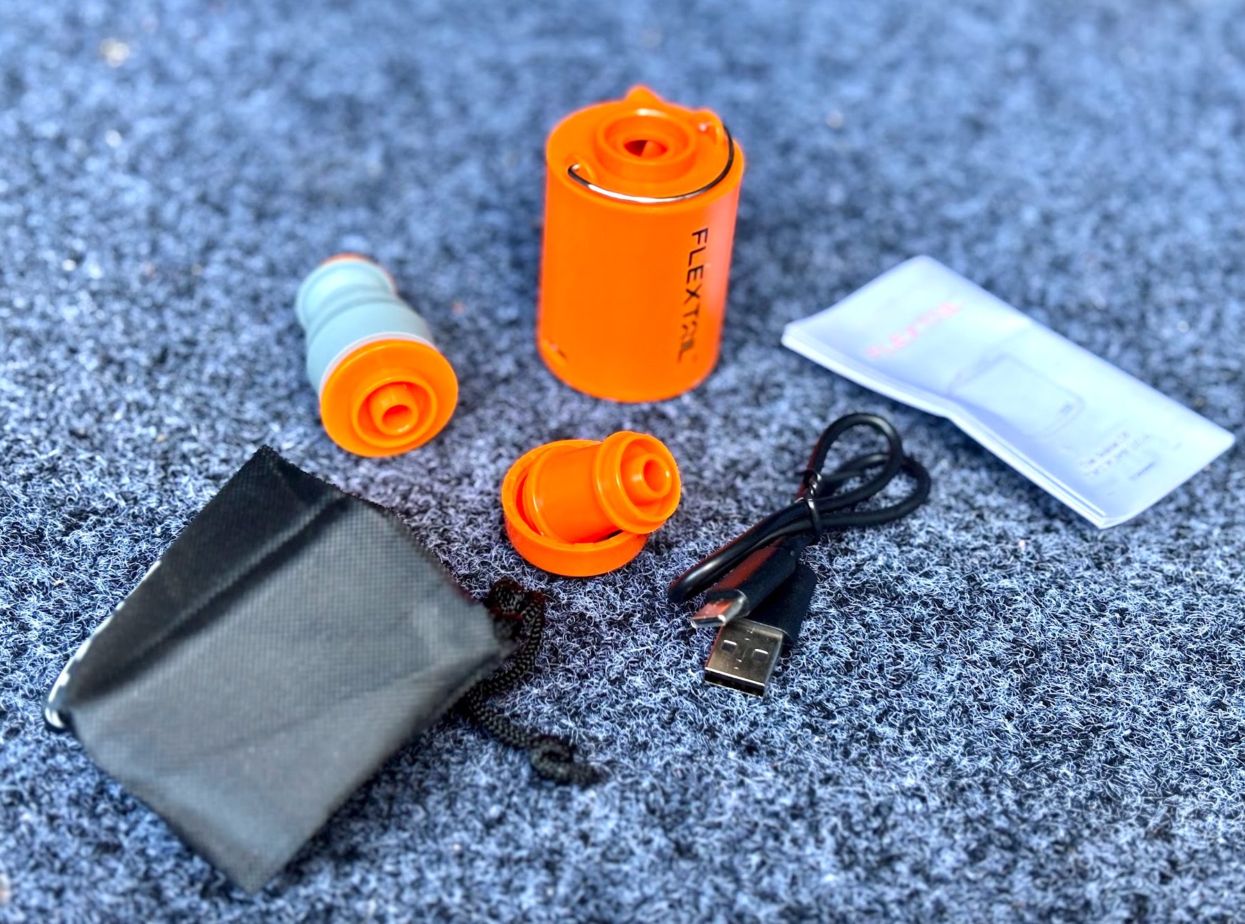 Flextail Tiny Pump unpacked including carry bag, charging cord and nozzles