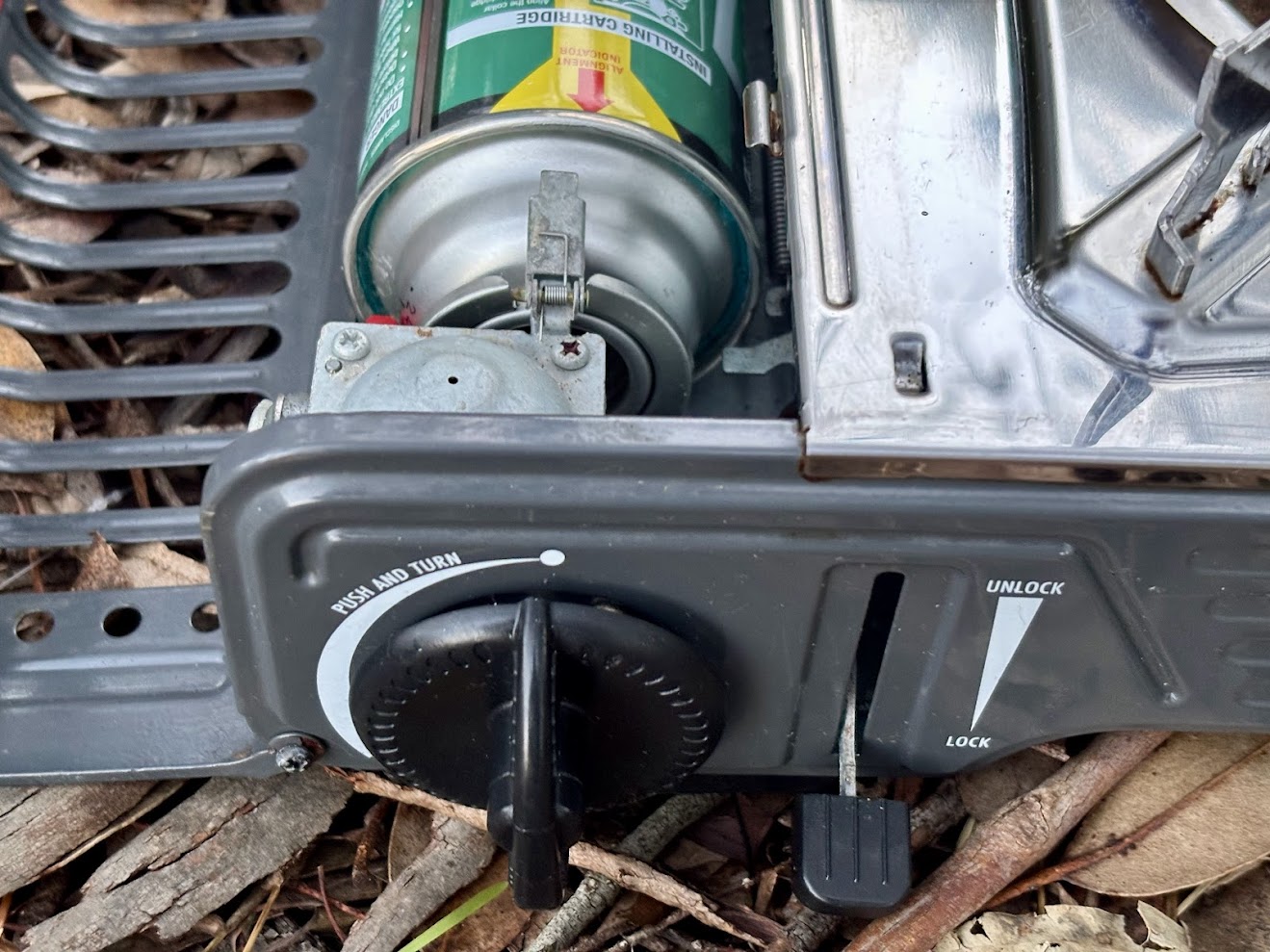 Locking a gas cannister in the Dune Dual Camp Stove