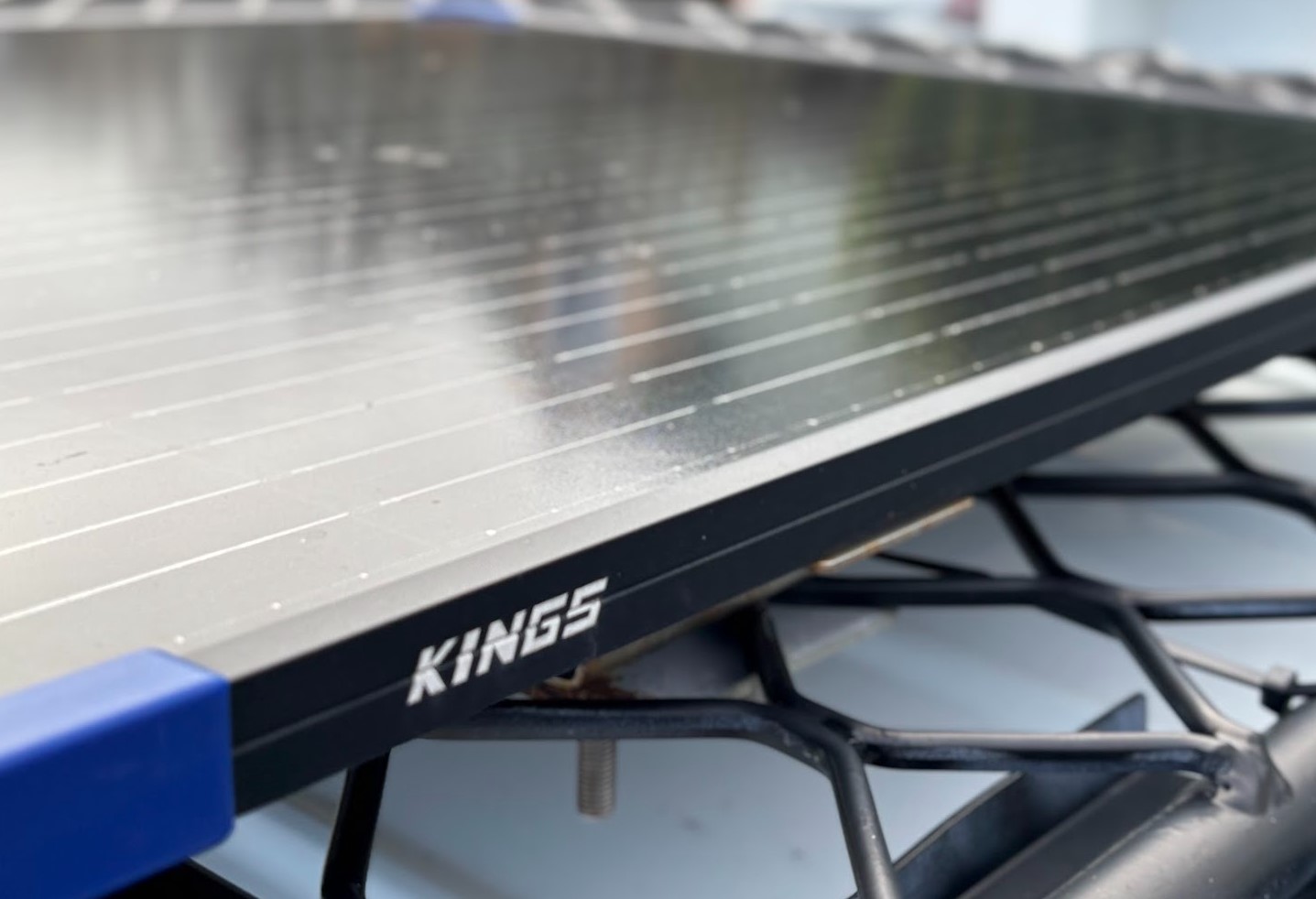 Side view with logo of the Kings 100W fixed solar panel