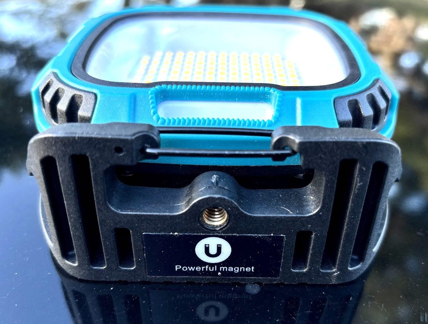 Strong magnet and hook on the bottom of the Smiling Shark rechargeable magnetic work light
