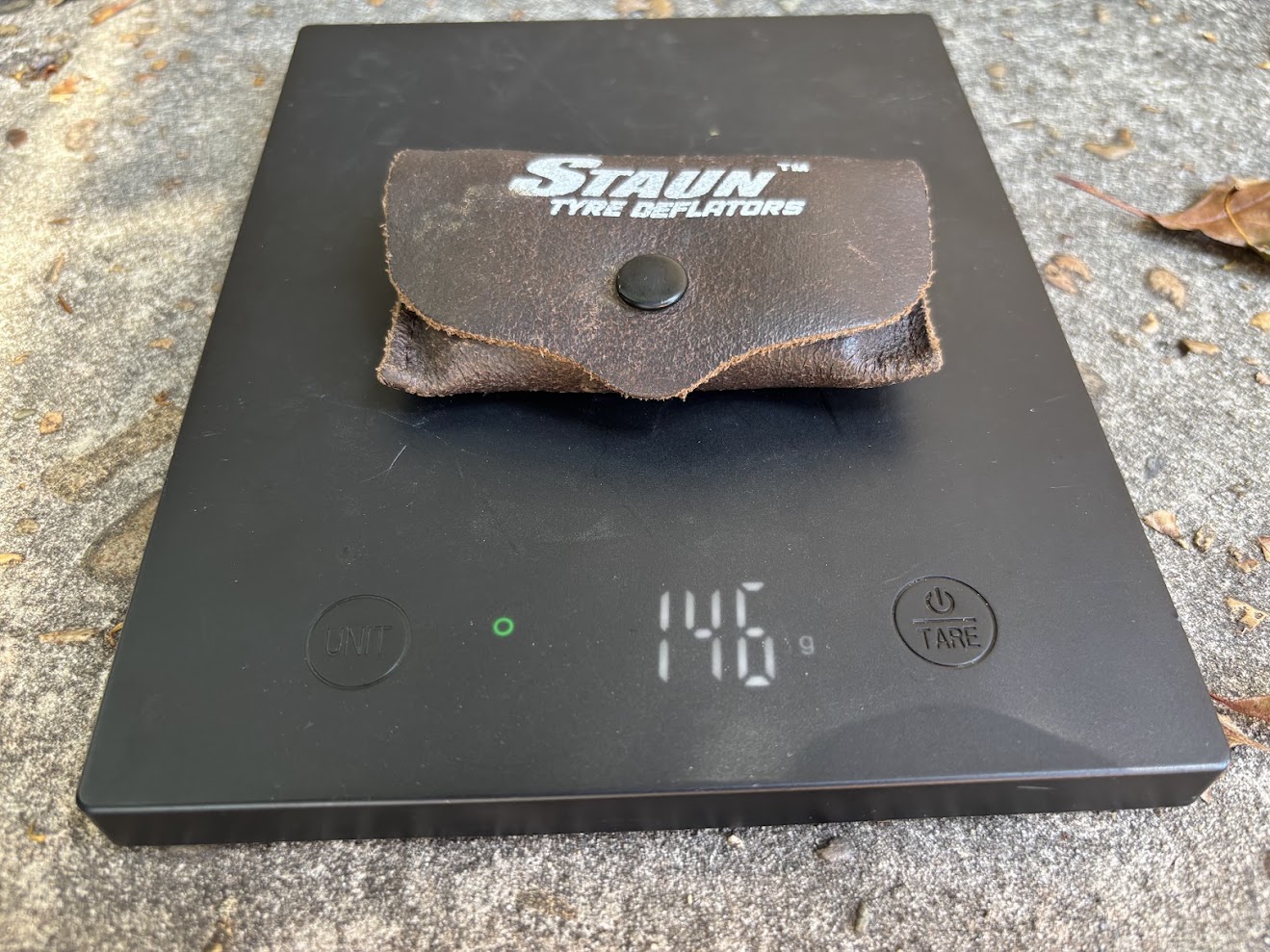 The whole set of four brass Staun Tyre Deflators including the leather carry bag comes in a just 146 grams