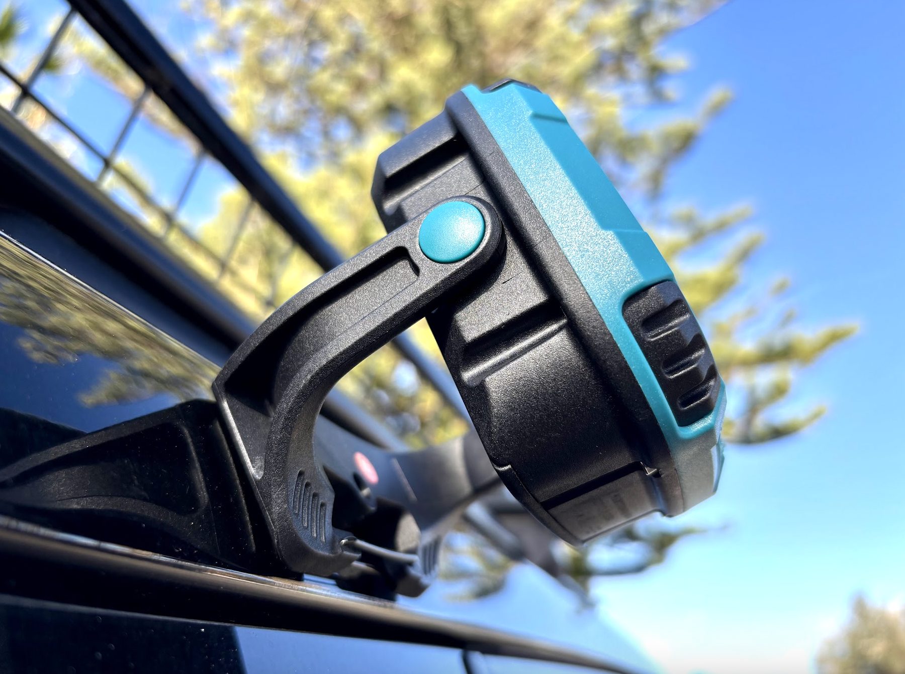 magnetic LED work light attached to side of 4WD