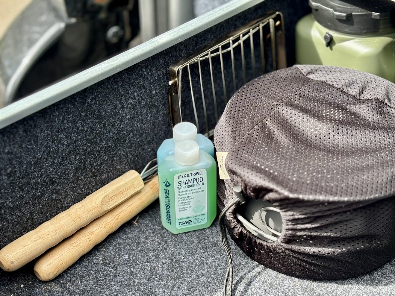 Storing the Naturehike camping pot set and Sea to Summit bottles in our Titan drawer system