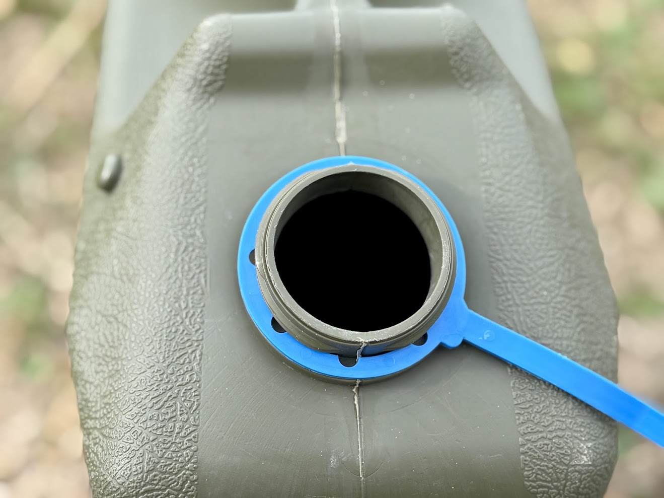 The 58mm wide-mouth opening of the Proquip water container is big enough to conveniently fill up the jerry can, but is not large enough for most portable shower systems