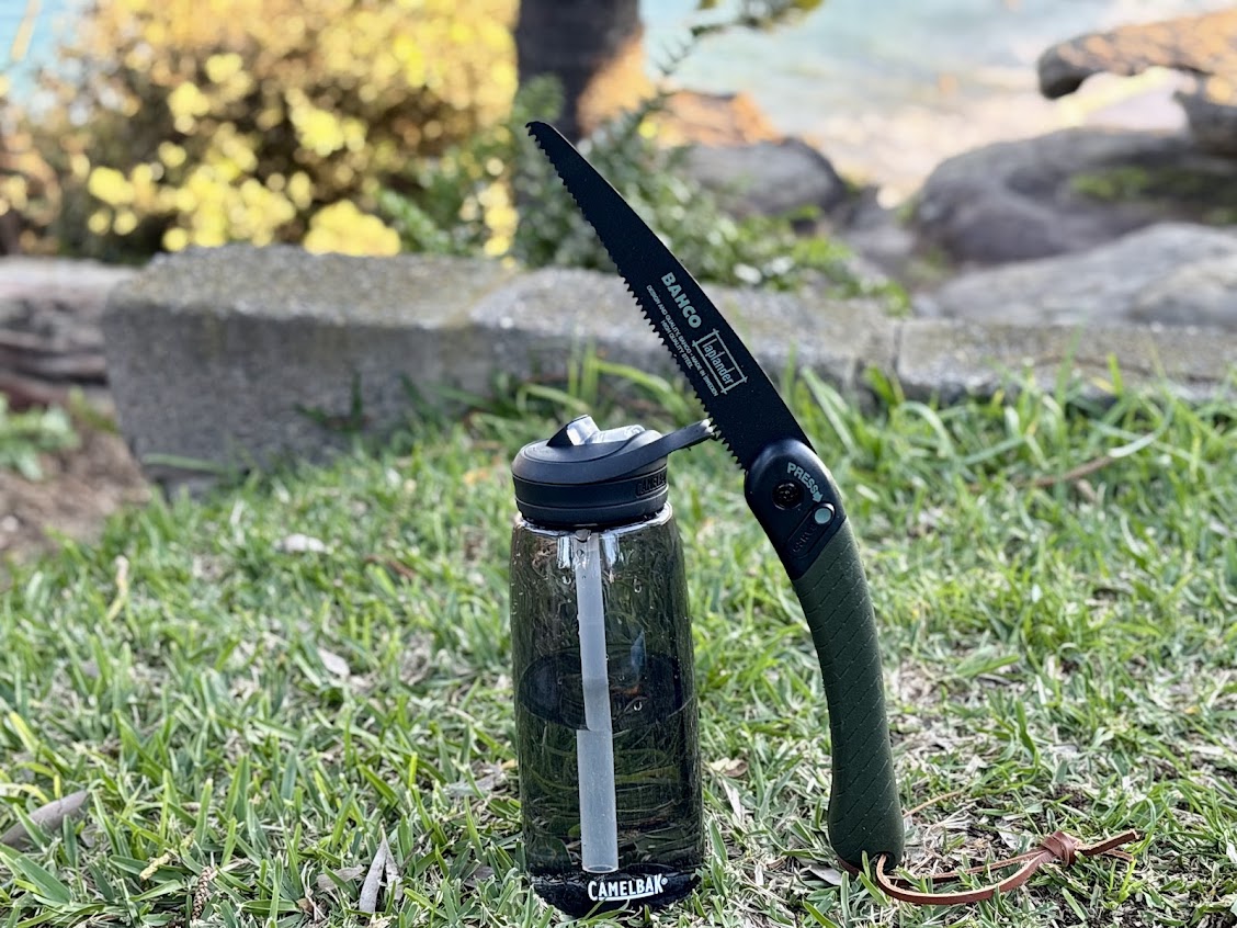 The Bahco 396-LAP laplander folding saw​ unfolds to 405mm providing a good amount of reach and leverage, here comparing next to the 23.5 high CamelBak Eddy+ water bottle