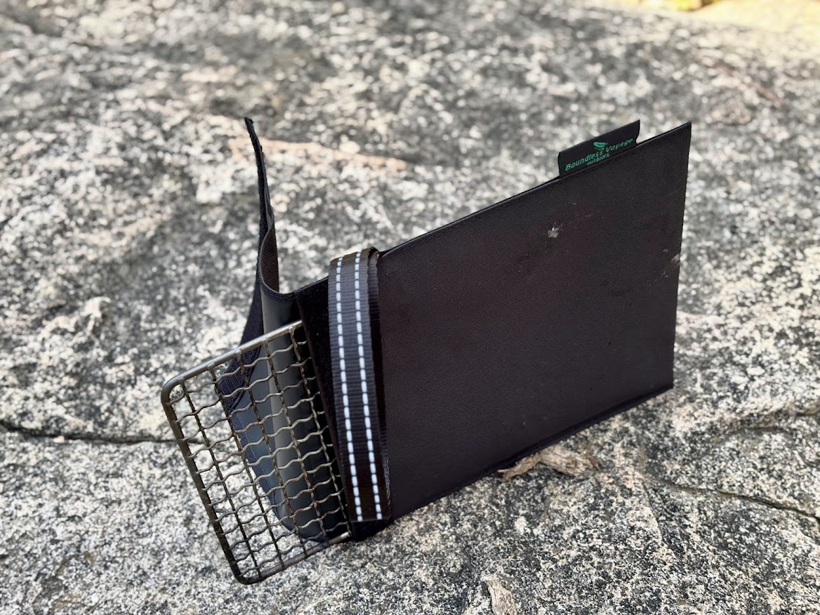 The Boundless Voyage titanium grill​ comes with a simple storage bag and hanging loop that’s a great addition for storing it
