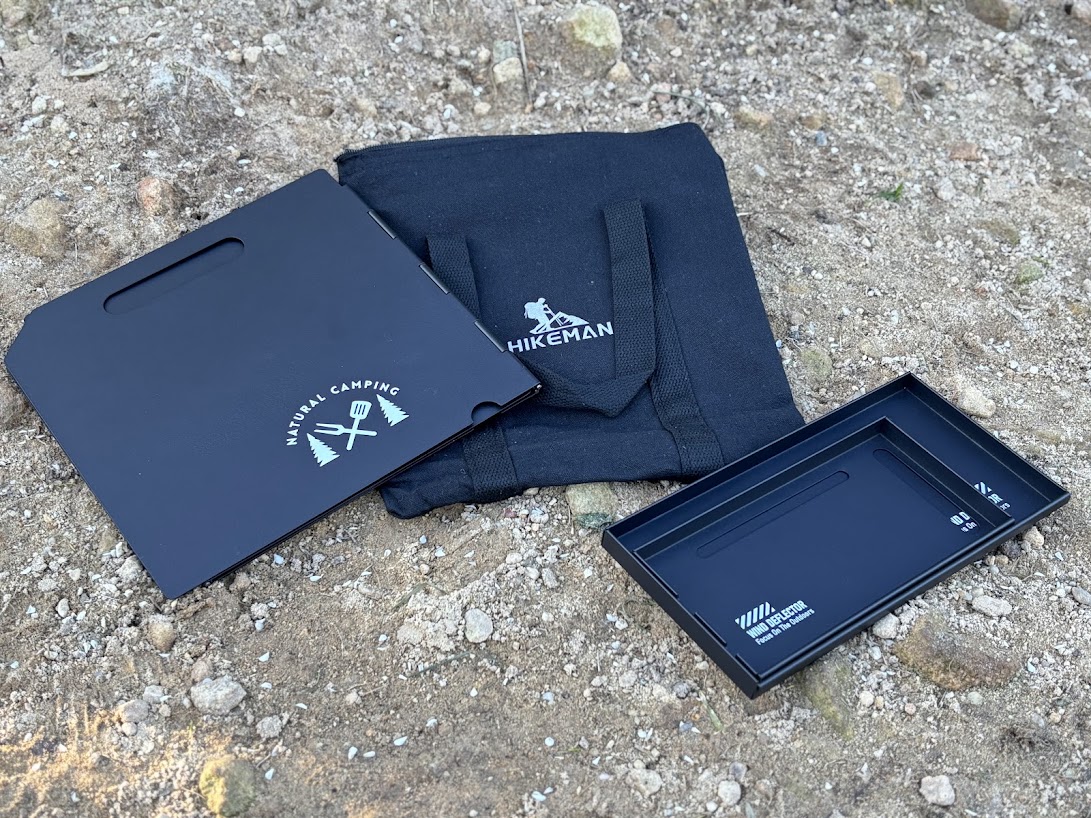 The Hikeman Camping Stove Windshield folds away to a small compact camp kitchen accessory that is surprisingly solid and well-made