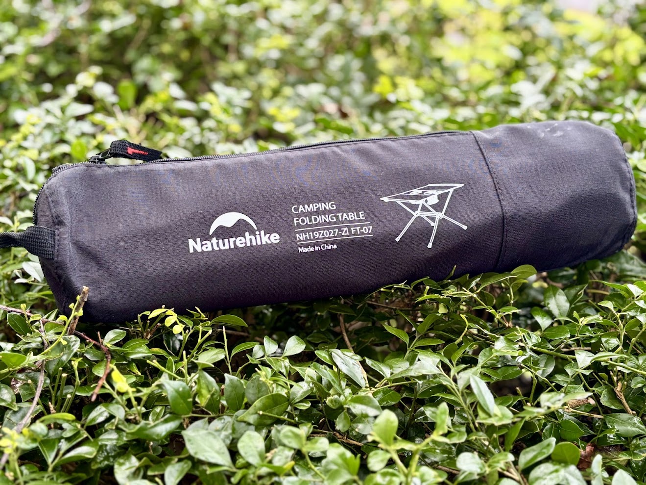 The Naturehike folding camping table packs incredibly small and weighs just 726g