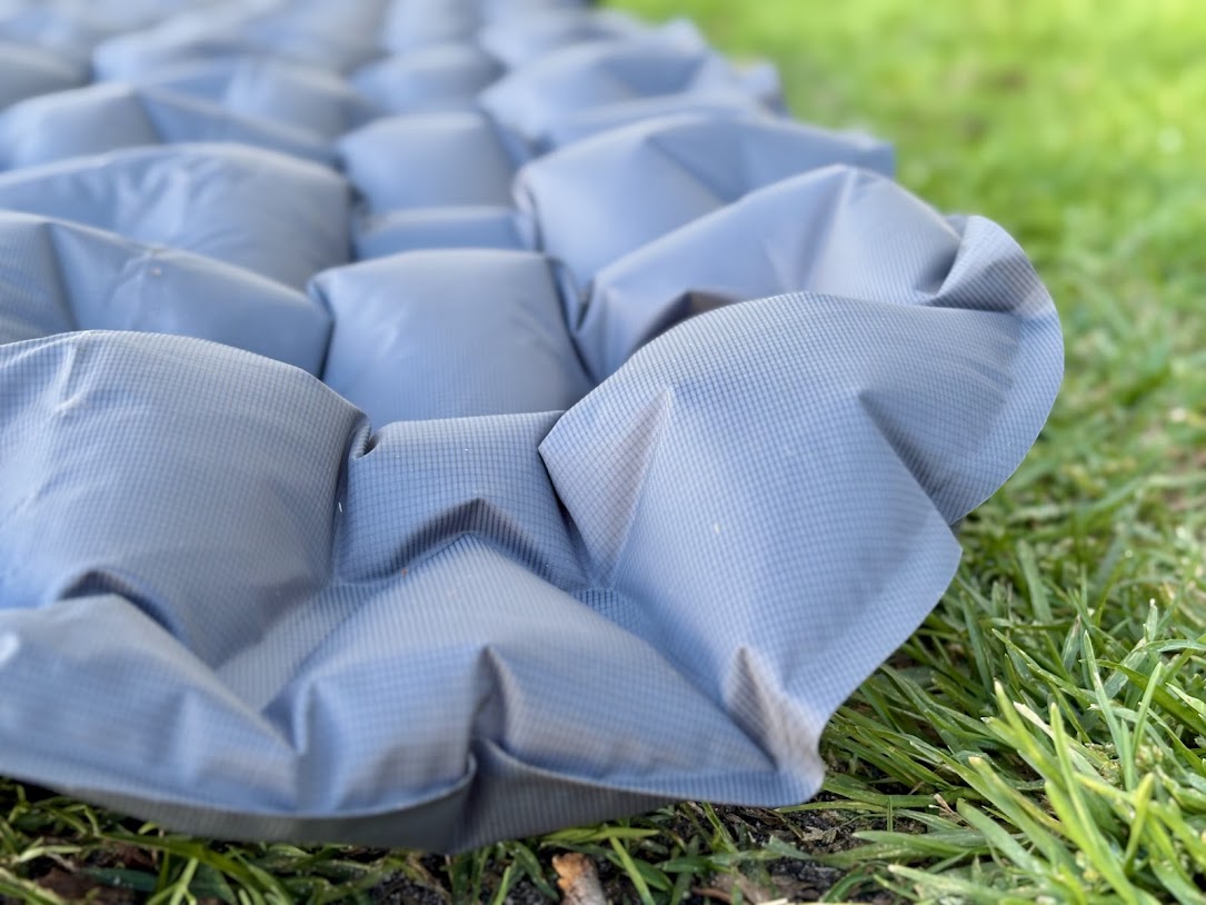 The Naturehike inflatable sleeping pad​ is constructed from a nylon fabric with a TPU inner layer