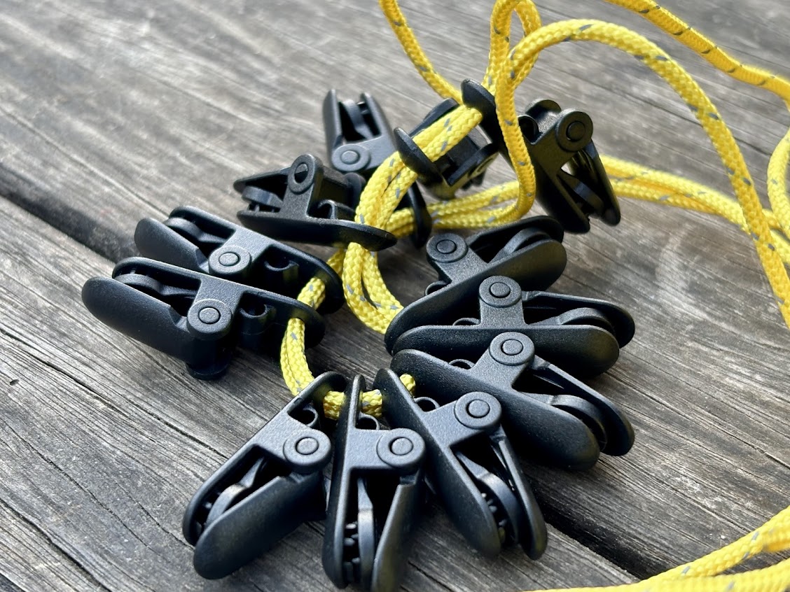 The clips of the Hikeman portable camping clothes line are made of a tough plastic and have a very strong clamping force
