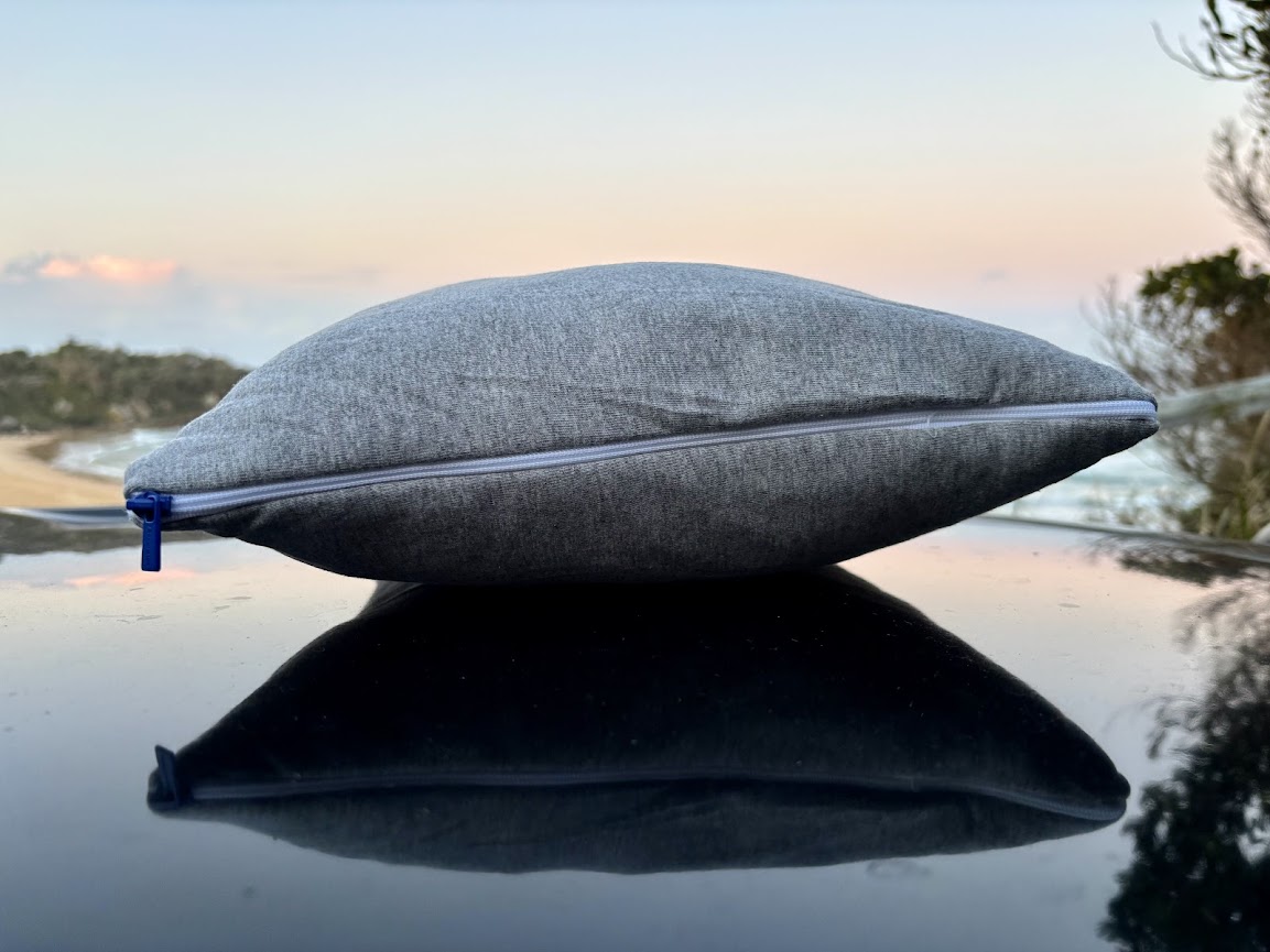 The cover of the Accuratex cotton travel pillow is removable with a long zipper on the side