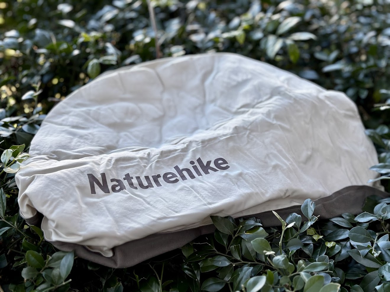 The fabric of the Naturehike inflatable pillow feels soft and pleasant