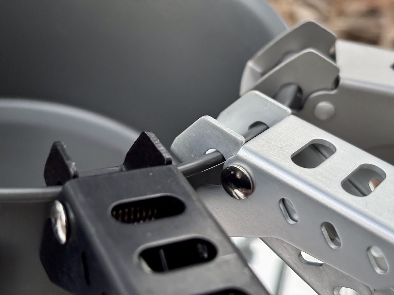 The grip on the camping pot lifter​s is very secure and clips well on the pot for carrying it around camp