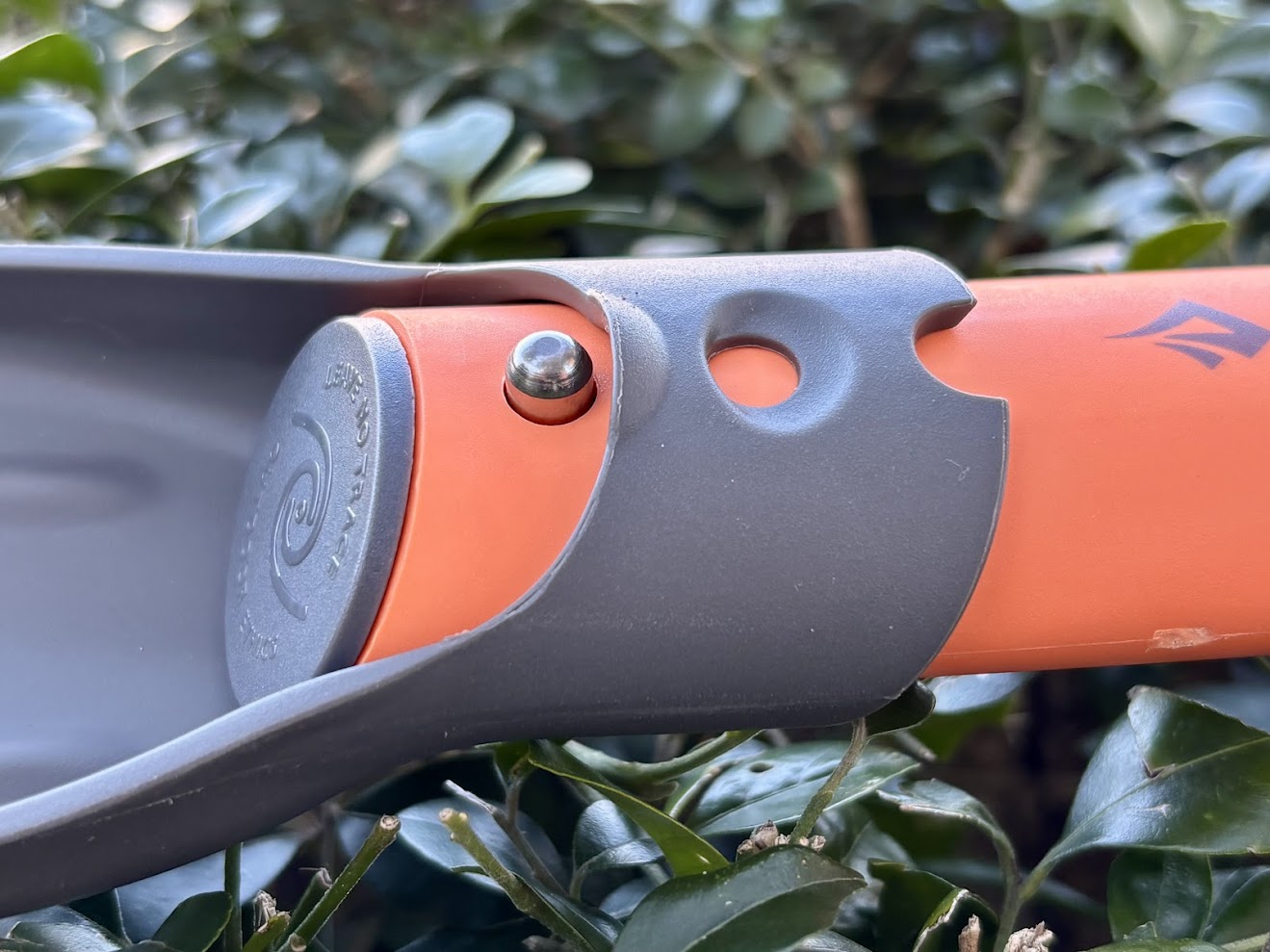 The handle of the pocket trowel from Sea to Summit slides smoothly and locks securely into place