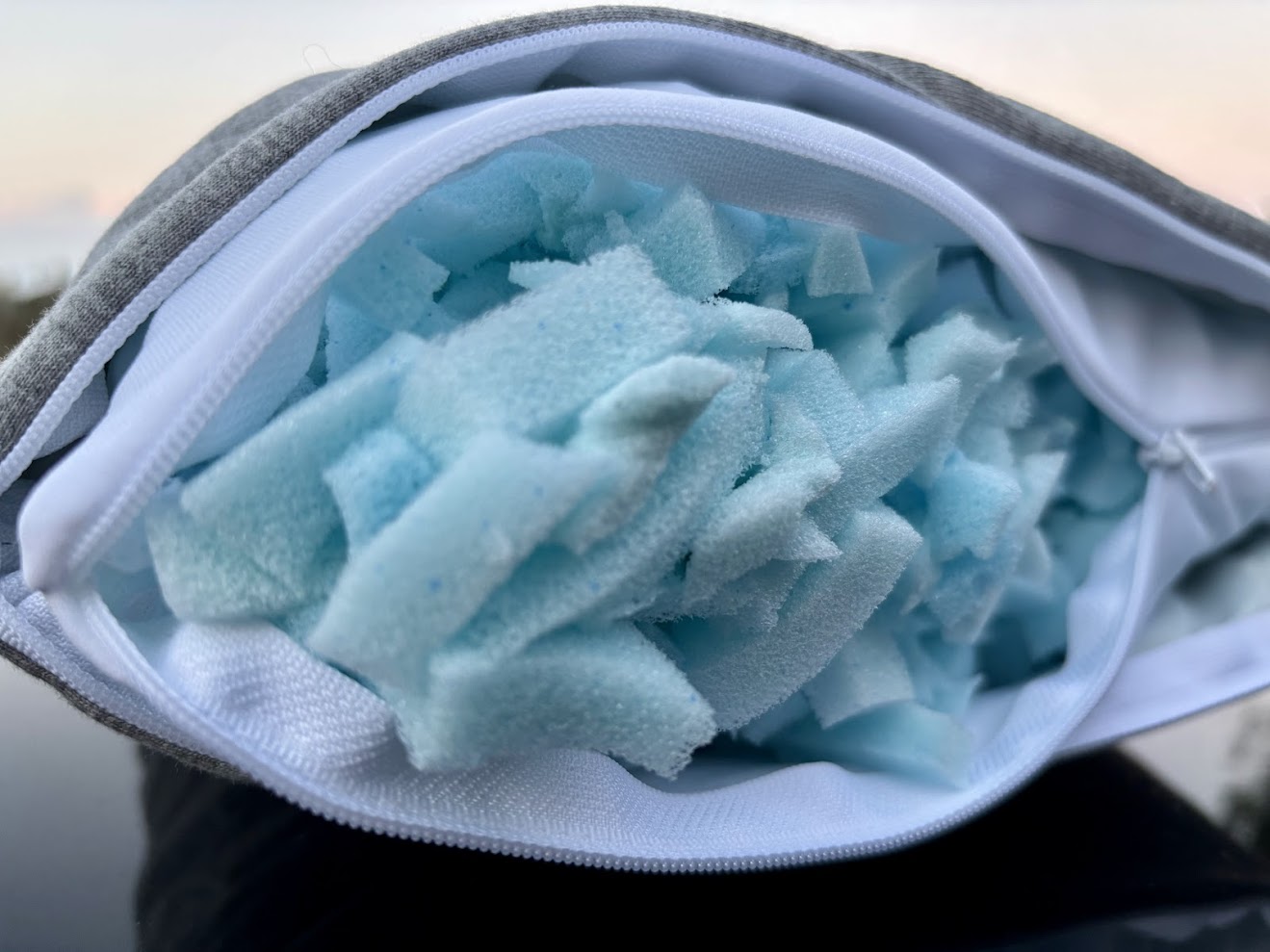 The shredded memory foam inside the Accuratex cotton camping pillow provides great comfort