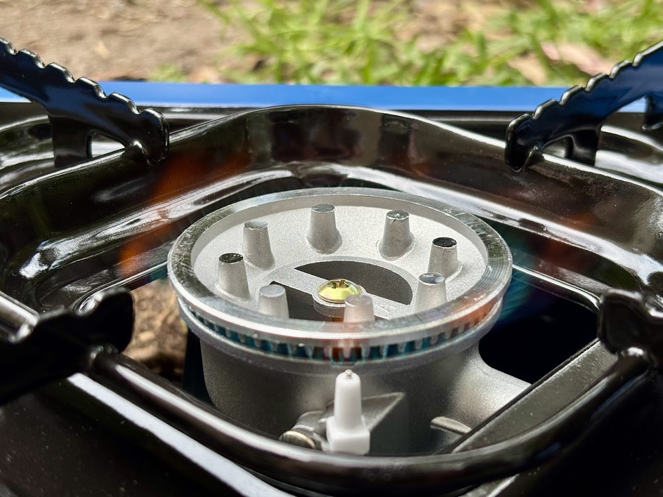 The steel trivet of the Companion butane stove​ provides a stable base for camp cooking