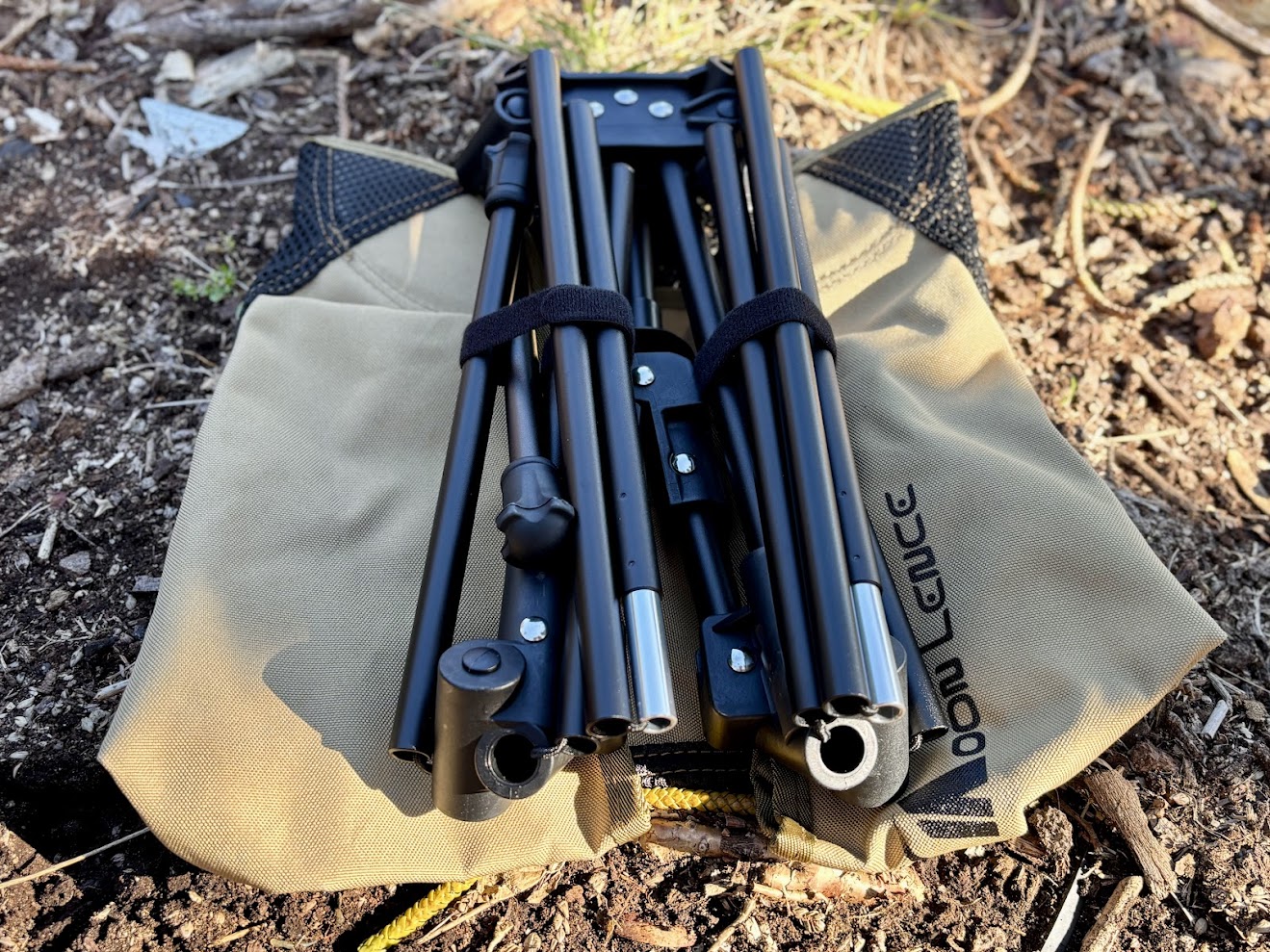 The straps that keep the frame of the Moon Lence hiking chair​​ bundled are actually attached to the frame itself so you'll never loose them
