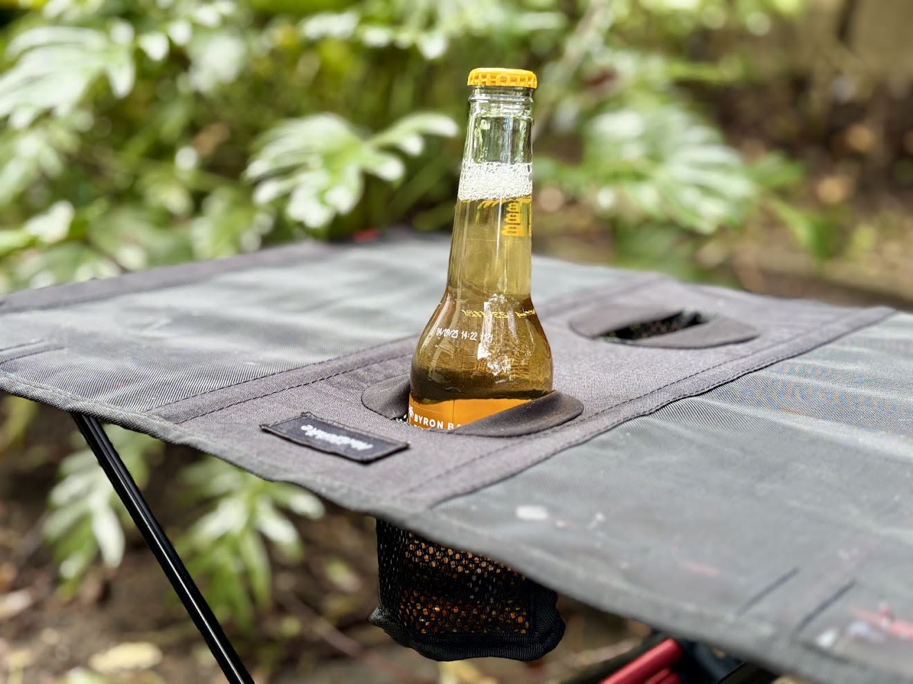 The two integrated cup holders of the Naturehike folding camping table are a simple but fantastic feature
