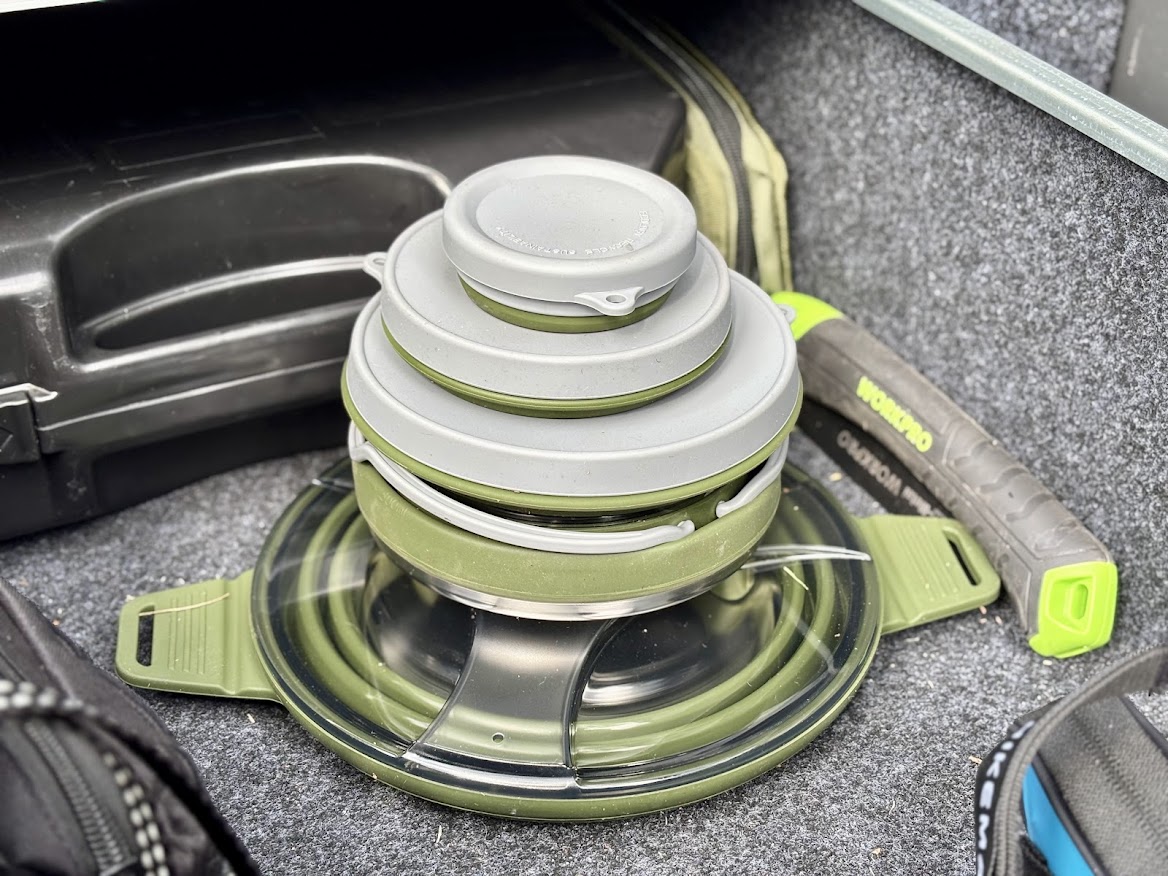 This dark green ​collapsible cookware set collapses really small so you can easily throw these anywhere in the storage space of your 4WD