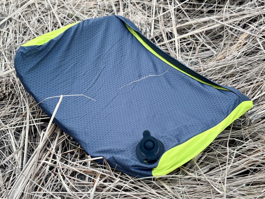 Unrolling the Zempire chill pill self inflating pillow which folds very flat when deflated