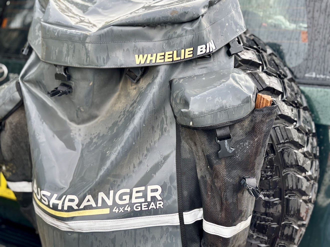 Using the 5L side pockets of the Bushranger wheelie bin to store kindling