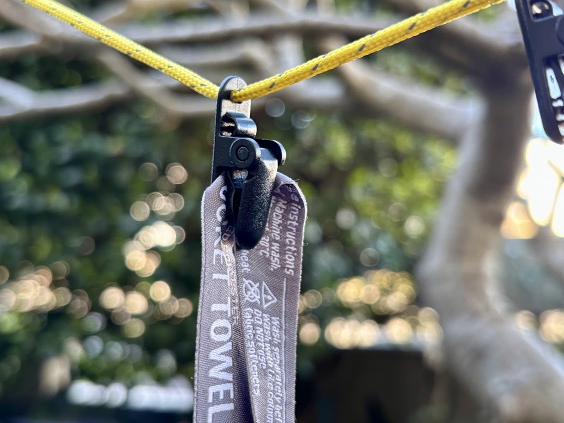 We use the Hikeman portable camping clothes line to hang our damp towels after a camp shower