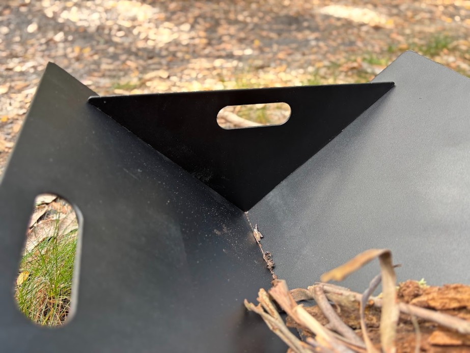 The 3mm thick laser-cut steel is crucial as it resists warping and maintains integrity even under extreme heat
