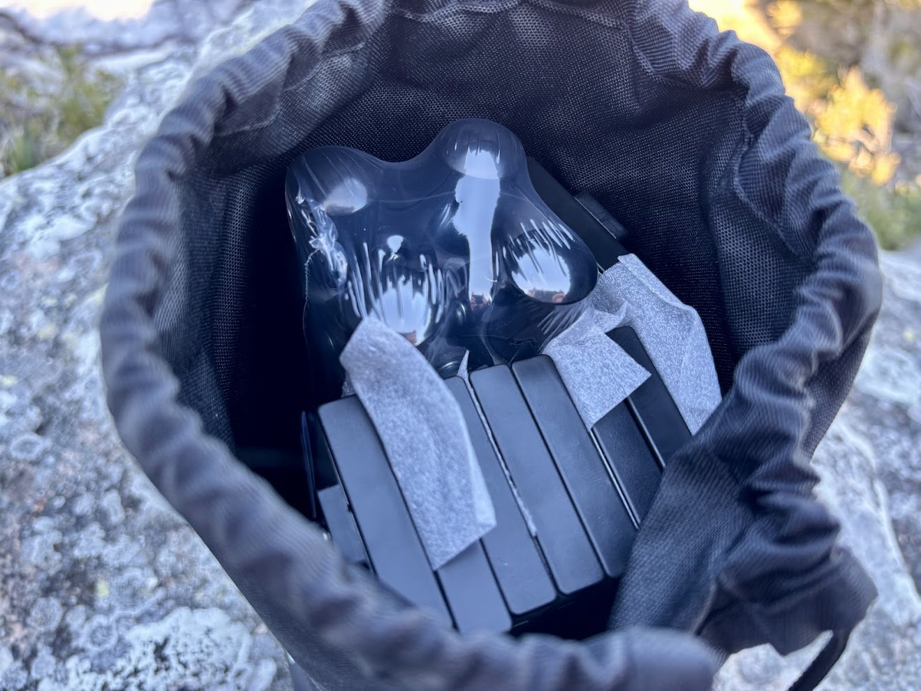 The Naturehike folding table's carry bag features a sturdy drawstring cord, and all its components are individually packed