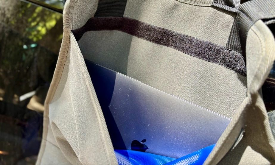 The back pocket on the Adventure Kings hanging camp caddy is a great feature that is perfectly sized to hold our Macbook or important documents