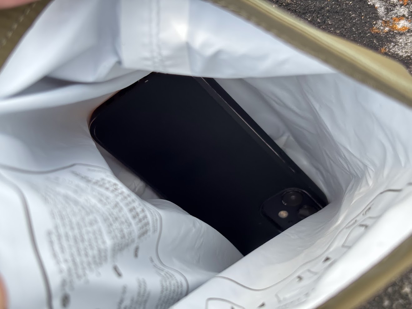 The bright white interior of the Sea to Summit lightweight dry bag is great as helps to quickly grab things like my phone