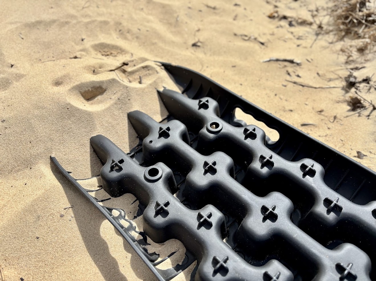 The design of the X-bull recovery tracks​ allows the board to double as a shovel